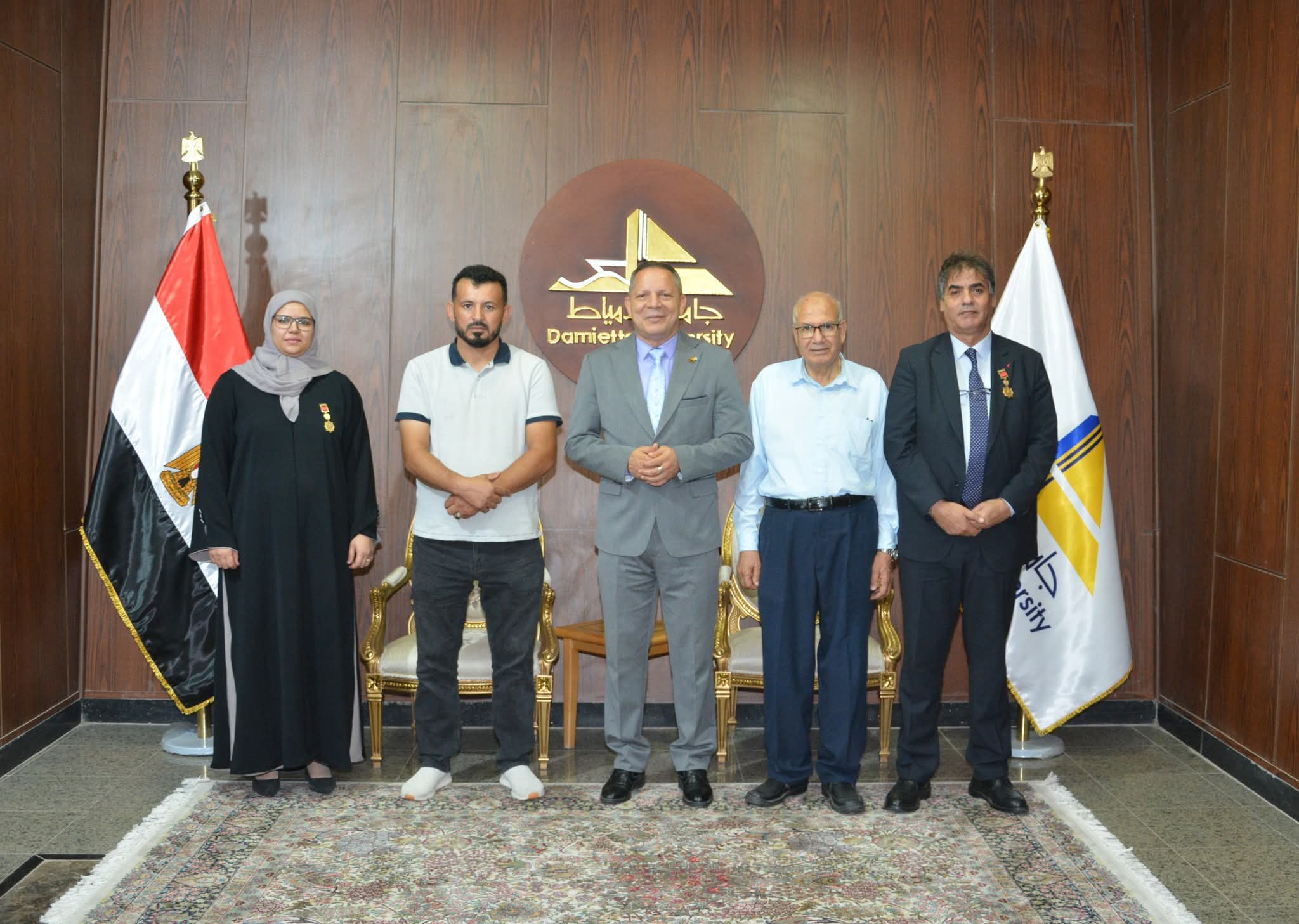 رئيس جامعة دمياط يكرّم باحثَين وافدَين من ليبيا لحصولهما على درجة الدكتوراه 1 FB IMG 1753016263430 جامعة دمياط رئيس جامعة دمياط يكرّم باحثَين وافدَين من ليبيا لحصولهما على درجة الدكتوراه موقع في الجامعة